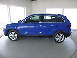 Škoda Karoq (2018) 1,6TDI*PARK.S**ALU***VYHŘ.SED. - náhled 9