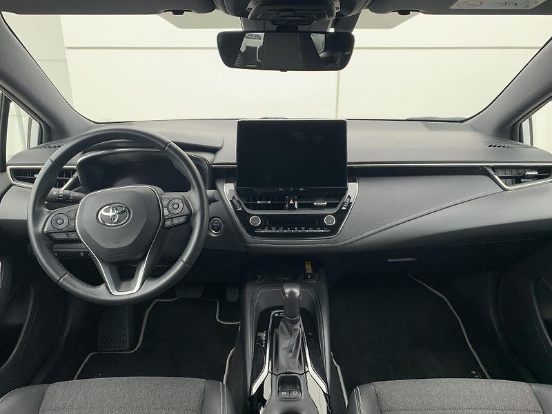 Toyota Corolla TS STYLE 1.8 HEV 103kW e-CVT - fotka 2 z 29