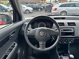 Suzuki Swift (2009) 1,3 i 66 Kw 4x4 - náhled 15
