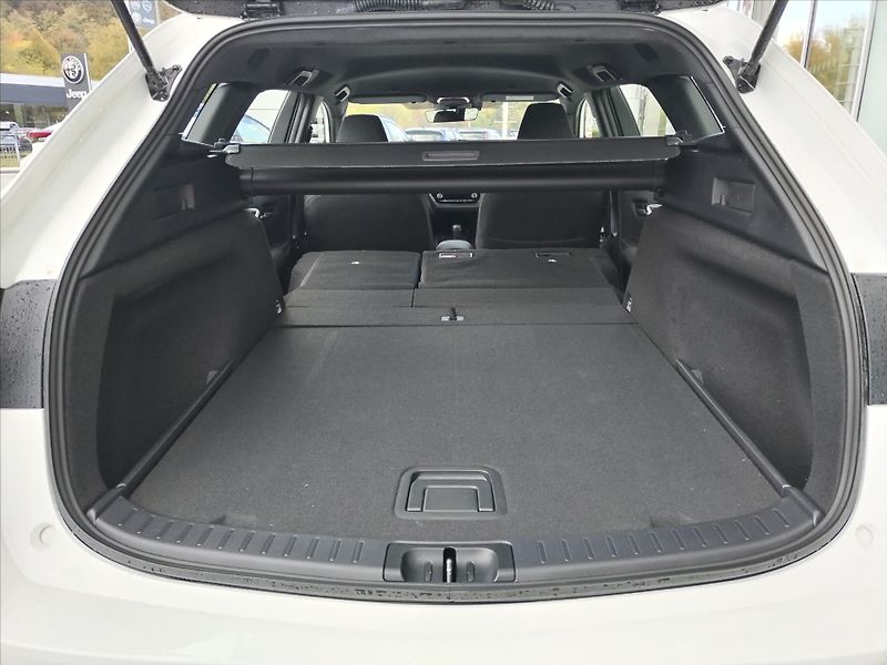 Toyota Corolla 1.8 HYBRID e-CVT  TS COMFORT T - fotka 14 z 16