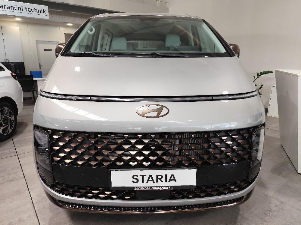 Hyundai Staria  25 HEV TOUR 7 LUX BRASS      