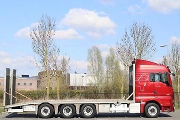 MAN TGX (2015) 33.560 8x4 transport strojů EU - fotka 4 z 21