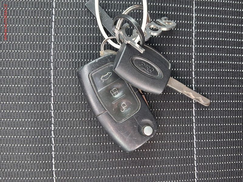 Ford Focus (2008) 1.6i, Klima - fotka 16 z 16