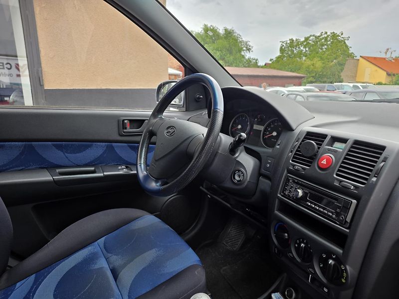 Hyundai Getz (2008) 1.1-2.MAJITEL-NÍZKÉ KM!!! - fotka 14 z 15