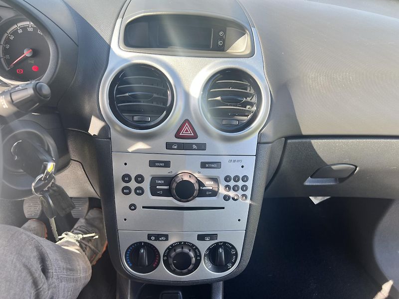 Opel Corsa 1,0 48KW,KLIMA,77TKM,1MAJITEL - fotka 29 z 34