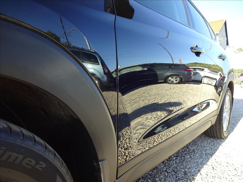Hyundai Tucson 1,6T- GDi 130kW Trikolor - fotka 13 z 58