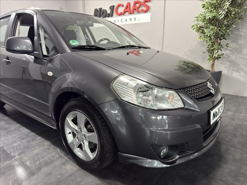 Suzuki SX4 1,6   VVT SPORT-LINE KEYLESS - fotka 33 z 35