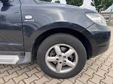 Hyundai Santa Fe (2007) 4X4 2,2CRDI 114KW 7 MÍST AUTOM - náhled 16
