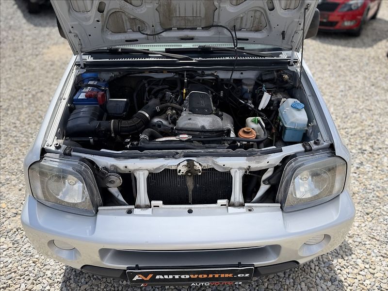 Suzuki Jimny 1,3 VVT 4X4 TAŽNÉ +SADA KOL - fotka 18 z 18
