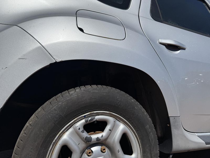 Dacia Duster (2012) 1.6i 77kW 4x4 - fotka 21 z 21