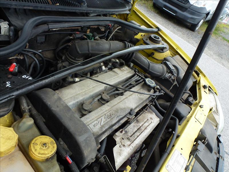 Ford Escort 1,6 16V El.střecha,klimatizace - fotka 30 z 41