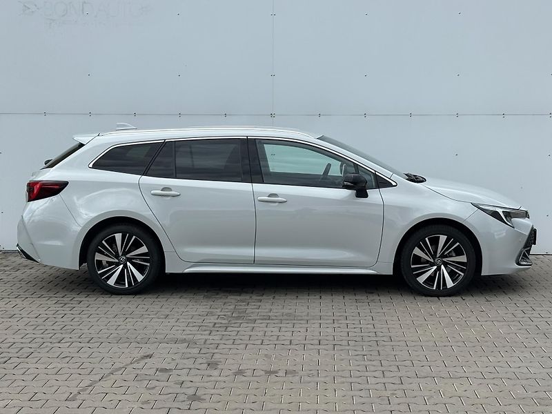 Toyota Corolla 1.8 HSD e-CVT Style Tech - fotka 8 z 28