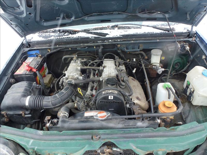 Suzuki Jimny 1,3 16v 4x4 Off Road, Na oprav - fotka 17 z 29
