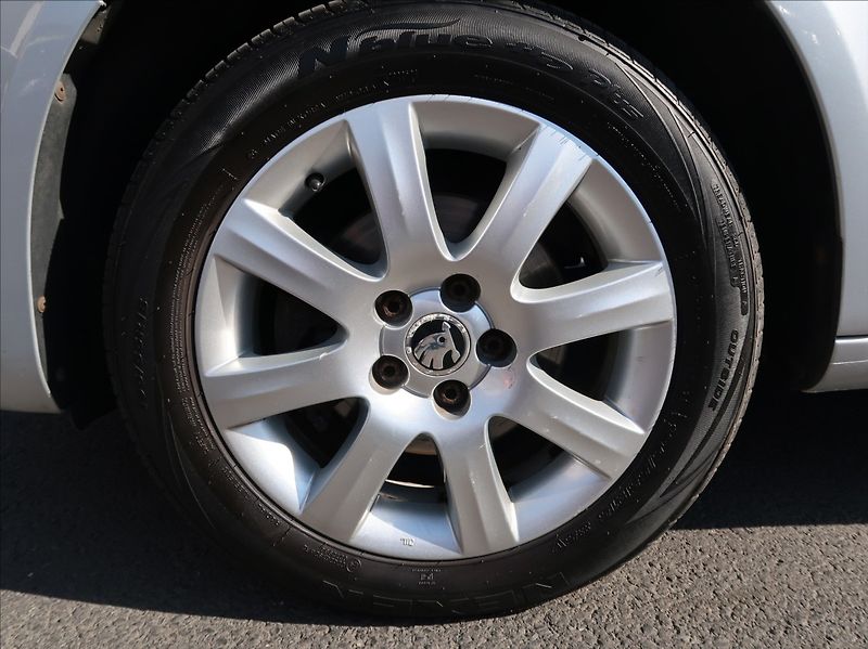 Škoda Roomster 1,2 TSi,63kW,1majČR,klima,tažn - fotka 21 z 22
