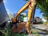 Caterpillar (2015) kolový bagr MH 3022 - náhled 4