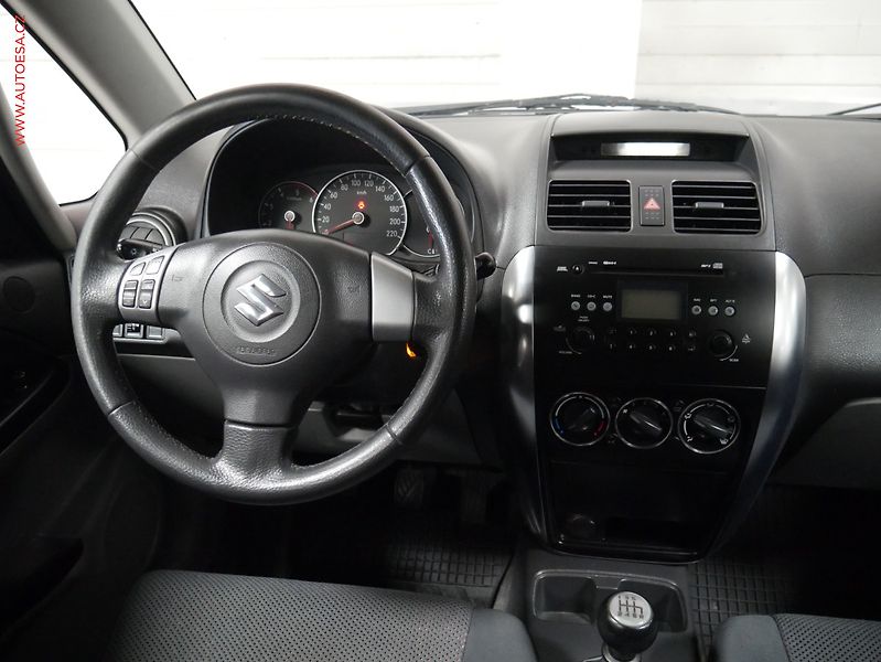 Suzuki SX4 (2006) 1.9 D, AC, výhřev sed - fotka 13 z 20