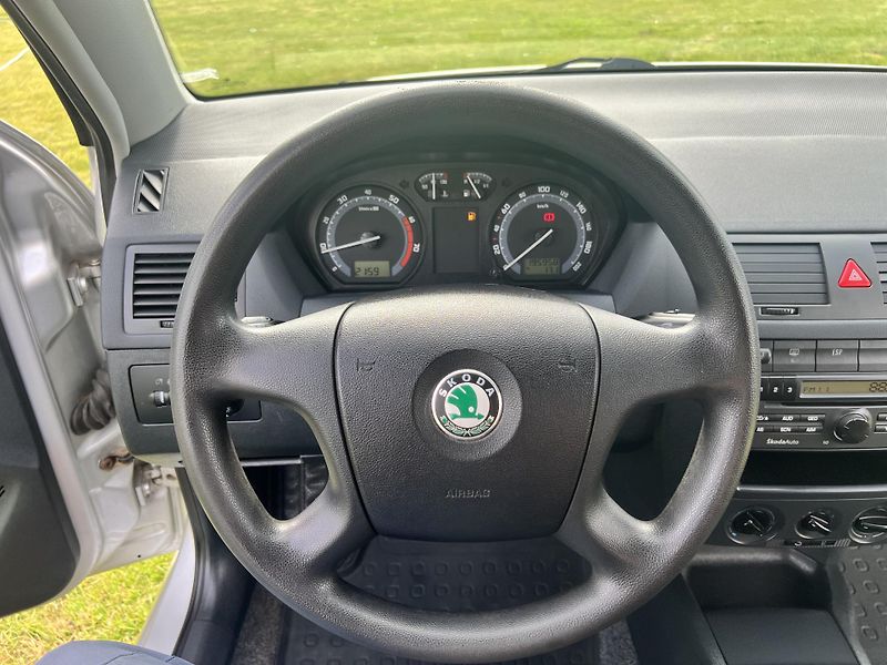 Škoda Fabia 1.4 59KW,TZ,KLIMA,TEMPOMAT,ESP - fotka 35 z 45