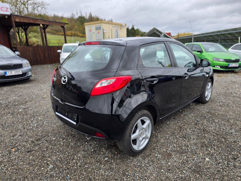 Mazda 2 (2010) 1.3 MZR 55KE klima - fotka 7 z 23