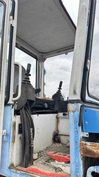 Menzi Muck (1985) 5000 T1.5 bagr kráčející 5.9t  - fotka 10 z 10