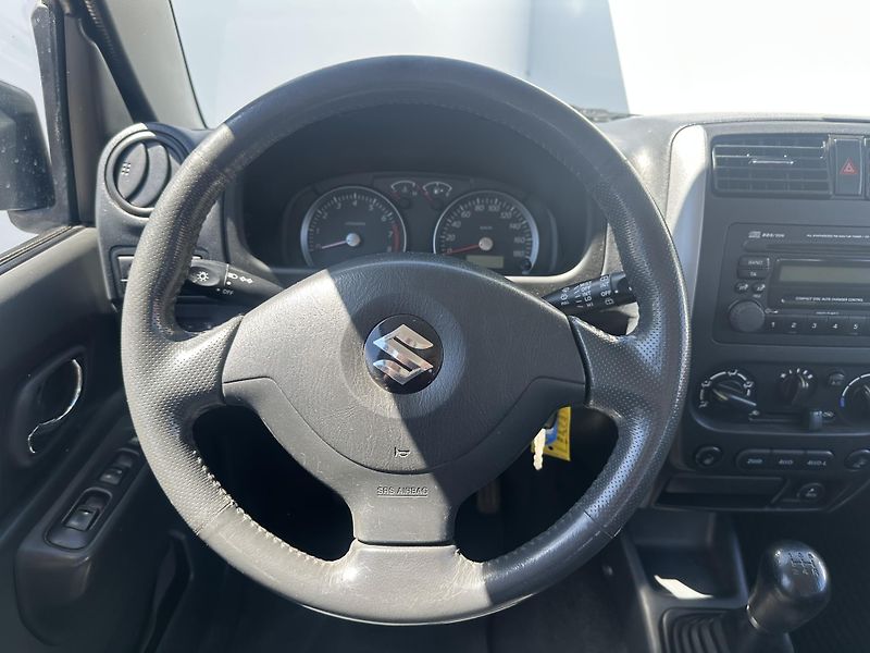 Suzuki Jimny (2006) 1.3i 63KW KLIMA  - fotka 15 z 18