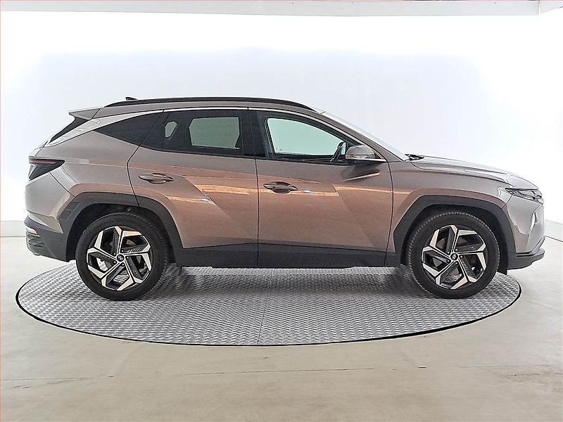 Hyundai Tucson (2022) 1.6 T-GDI HEV - fotka 6 z 23
