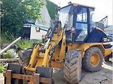 Kolový nakladač Caterpillar 908.