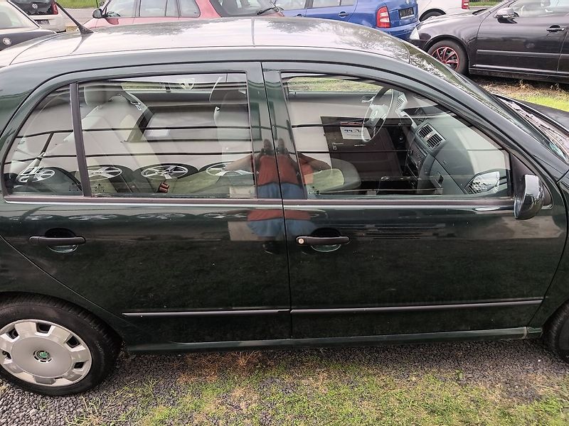 Škoda Fabia 1.4 MPI Comfort - fotka 6 z 26