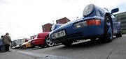 Sraz automobilů Porsche 911, parkoviště u obchodního centra Arkády 18. dubna.