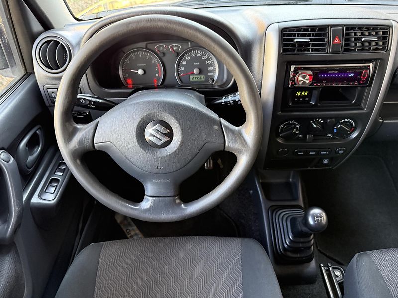 Suzuki Jimny 1,3 4x4 Servisní kniha - fotka 14 z 21