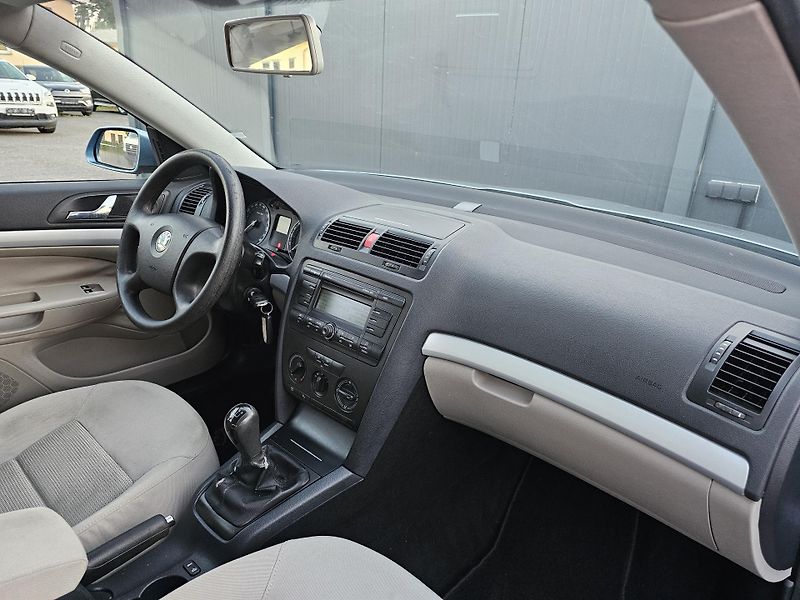 Škoda Octavia 1.6 85kW,KLIMA,TEMPOMAT,2xKOLA - fotka 26 z 37