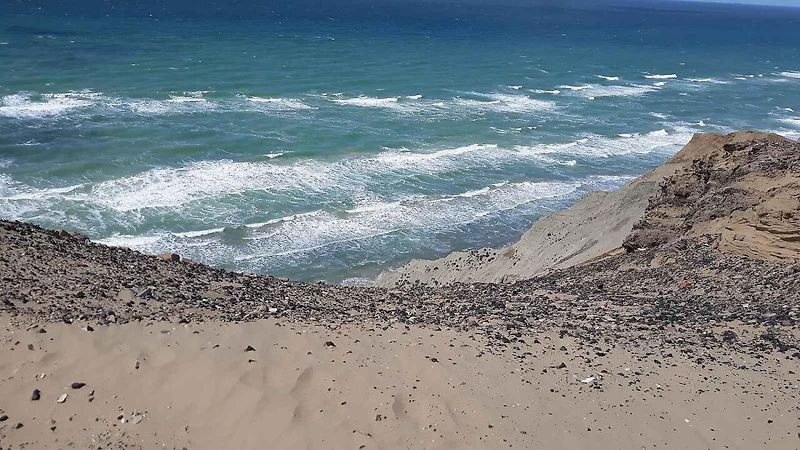Obří písečná duna Rubjerg Knude vytváří na samotném severu Dánska dojem mnohakilometrové pouště.