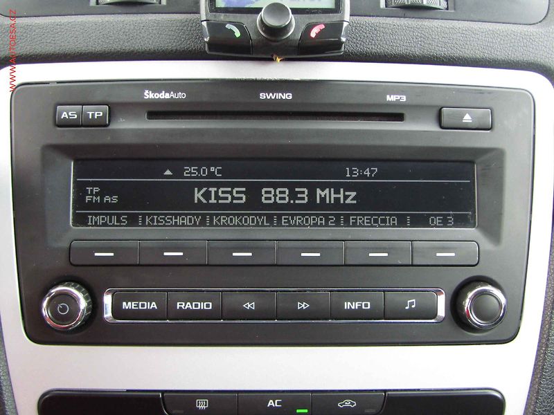 Škoda Octavia (2009) 1.9 TDi, autoAC, temp - fotka 14 z 17