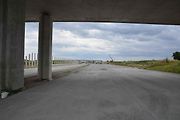 Pokládka cementobetonového a asfaltového povrchu vozovky na stavbě dálnice D1 mezi Říkovicemi a Přerovem, 28. června 2025